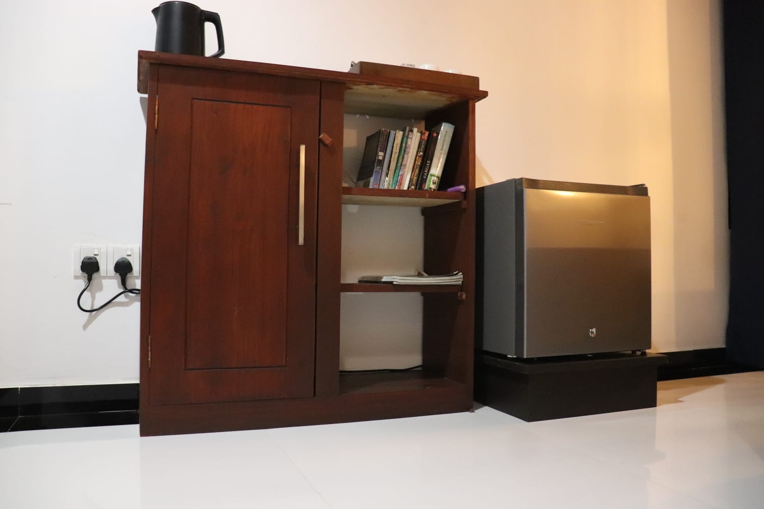 Mini fridge and kettle amenities
